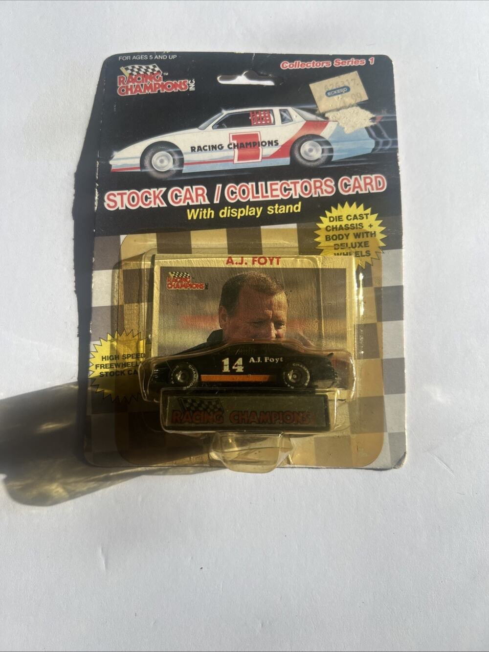 AJ FOYT #14 1989/90 AJ FOYT 1:64 RACING CHAMPIONS DIECAST CAR WITH CARD